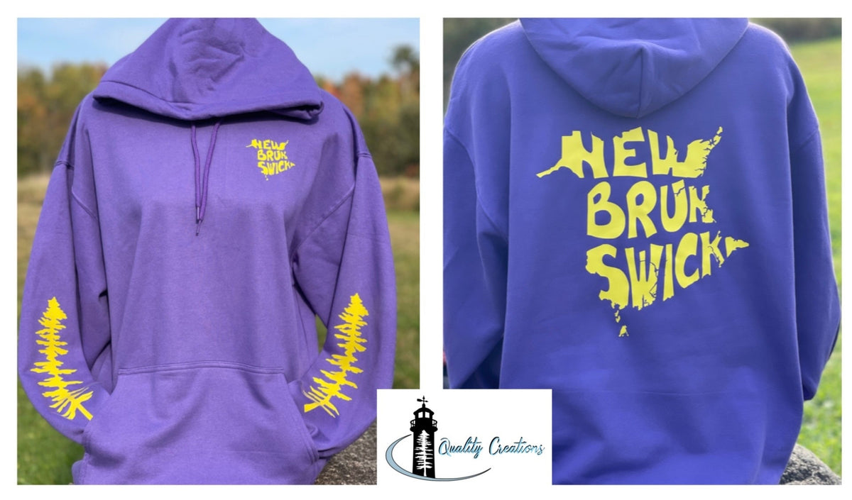 A purple pullover hoodie shown from the front and back. The front has a small yellow 'New Brunswick' logo on the left chest and yellow pine tree graphics on both sleeves.
