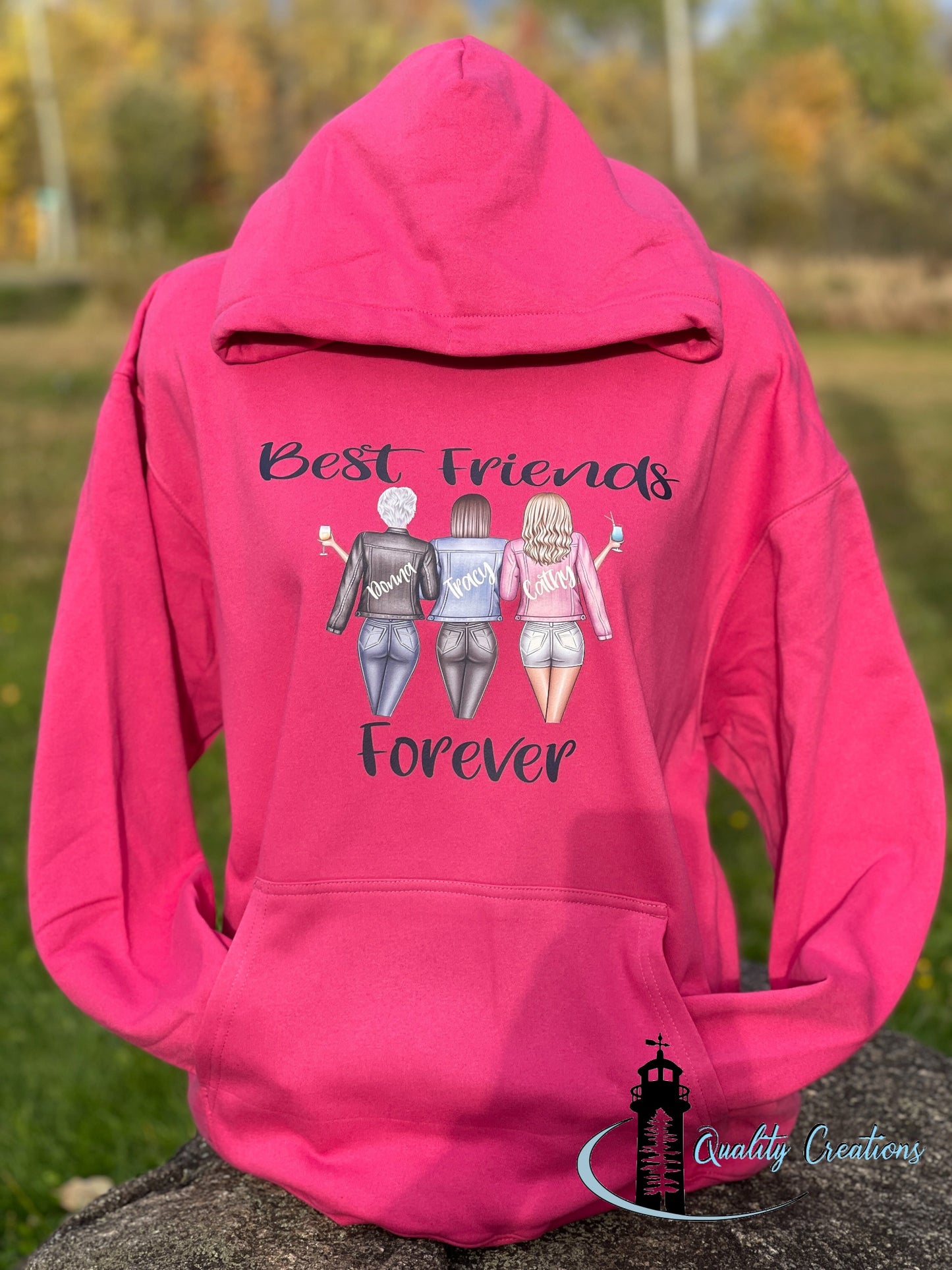 Custom pink hoodie with Best Friends Forever design featuring three cartoon-style women by Quality Creations