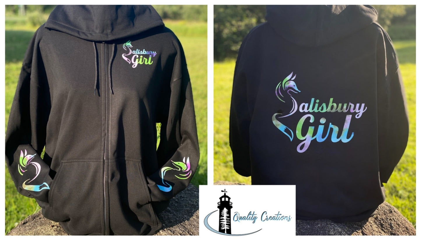 Black zip-up Salisbury Girl hoodie with rainbow tie-dye text and fox graphics on the arms. Inspired by the home of the Silver Fox in Salisbury, New Brunswick, Canada.