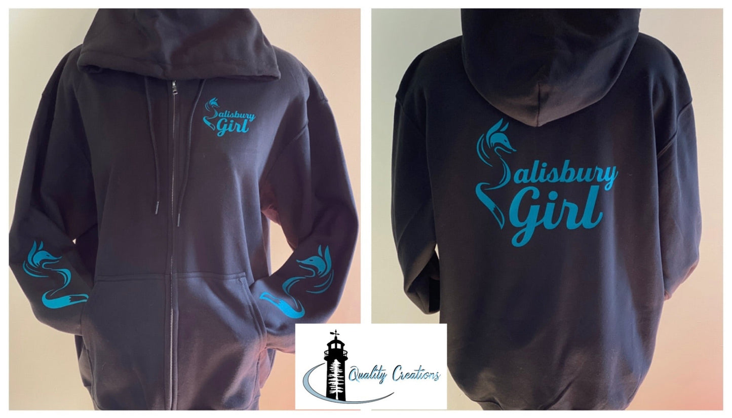Black Salisbury Girl zip-up hoodie with turquoise text and fox sleeve graphics. Designed in Salisbury, New Brunswick—home of the Silver Fox, near Moncton and Sussex.