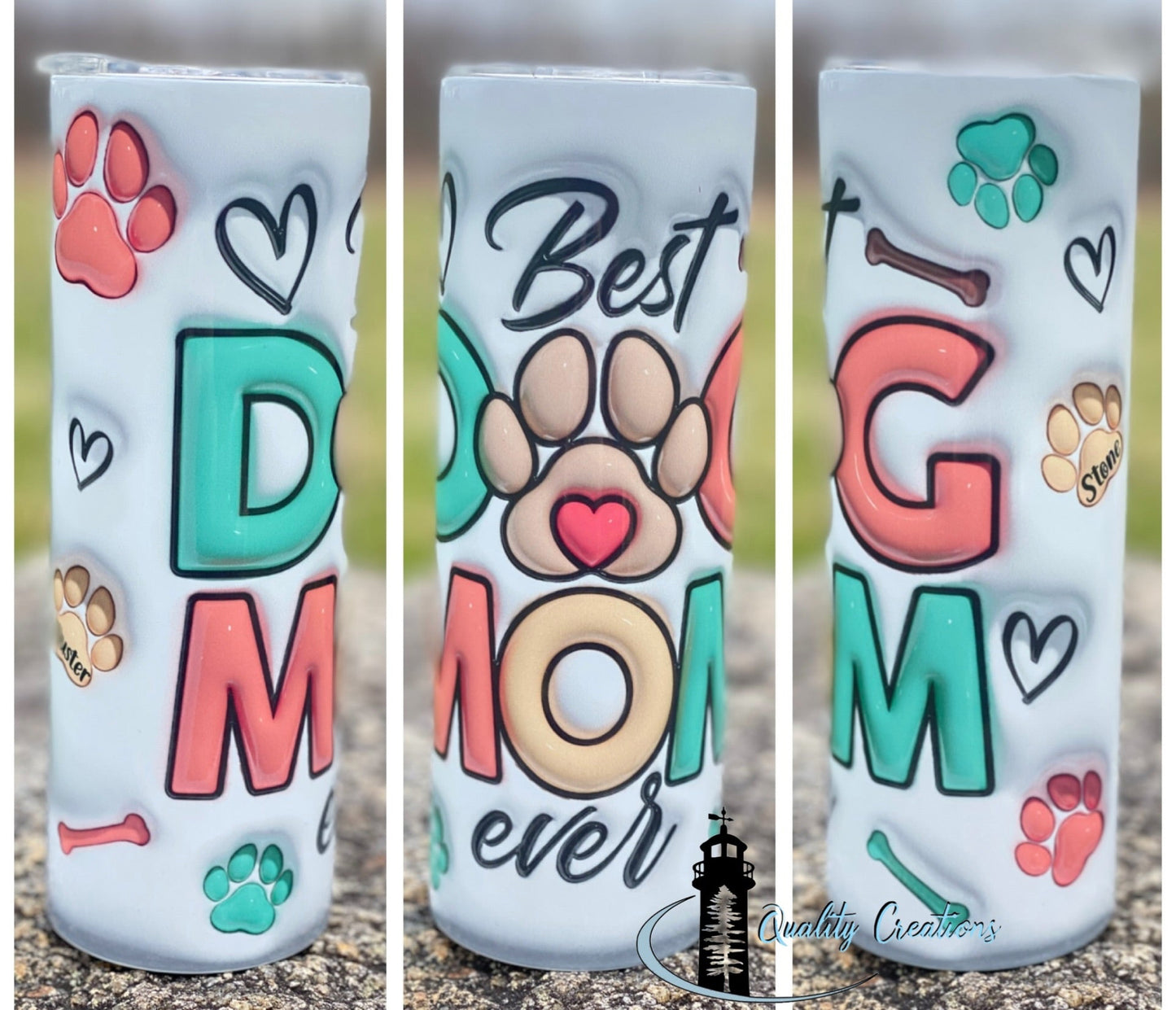 tumbler featuring a colorful 'Best Dog Mom' design with paw prints, hearts, and bones on a split outdoor background. For hot and cold drinks