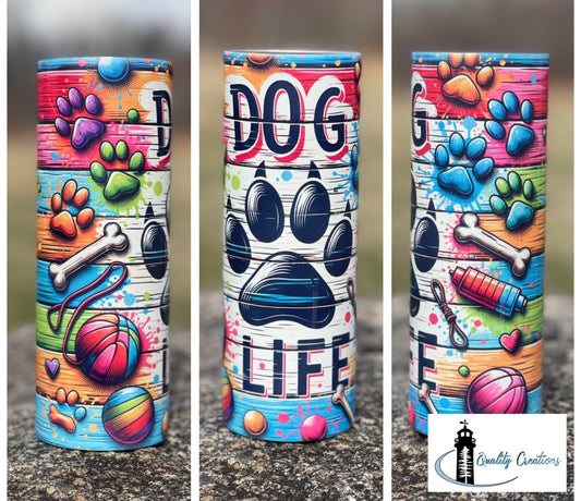 Colourful Dog Life tumbler featuring bright paw prints, bones, toys, and a large black paw print – handmade by Quality Creations. qualitycreations247, Salisbury, Moncton, New Brunswick, Canada