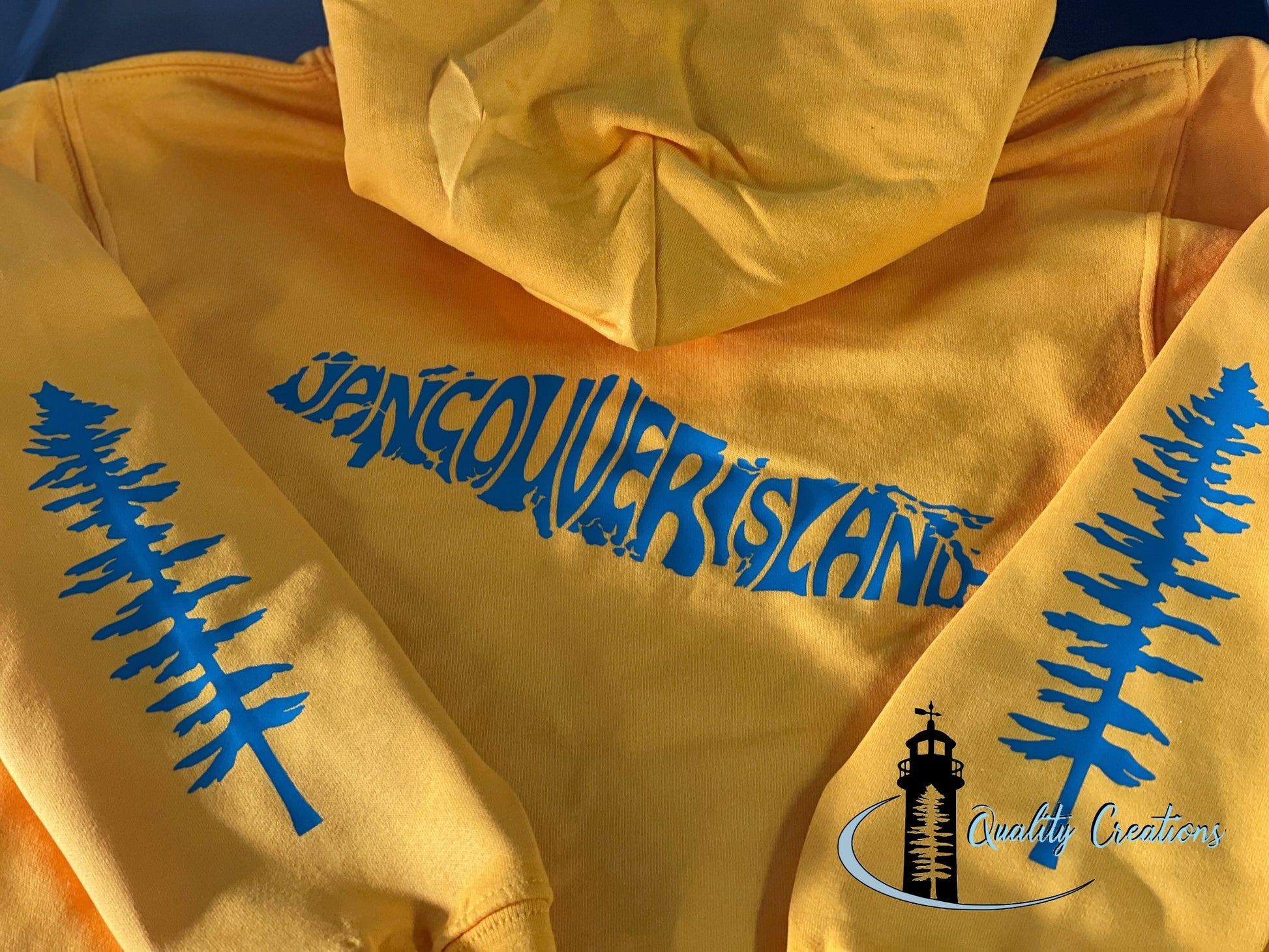 Vancouver island design with Sitka tree on arms, gold hoodie, blue design font, Campbell river, Courtney, Canada, qualitycreations247, Ontario, newbrunswick, nb, Salisbury, Moncton range 