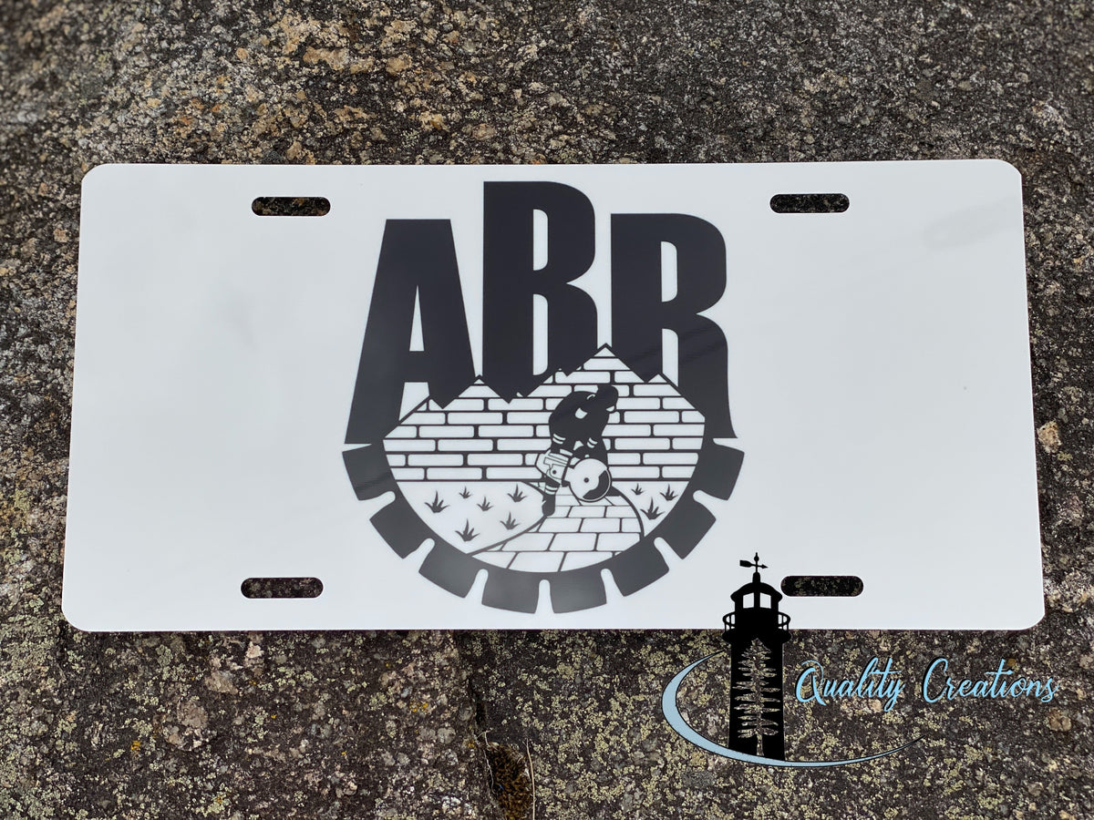 Custom business logo license plate made by Quality Creations in Salisbury, New Brunswick for a local Salisbury business