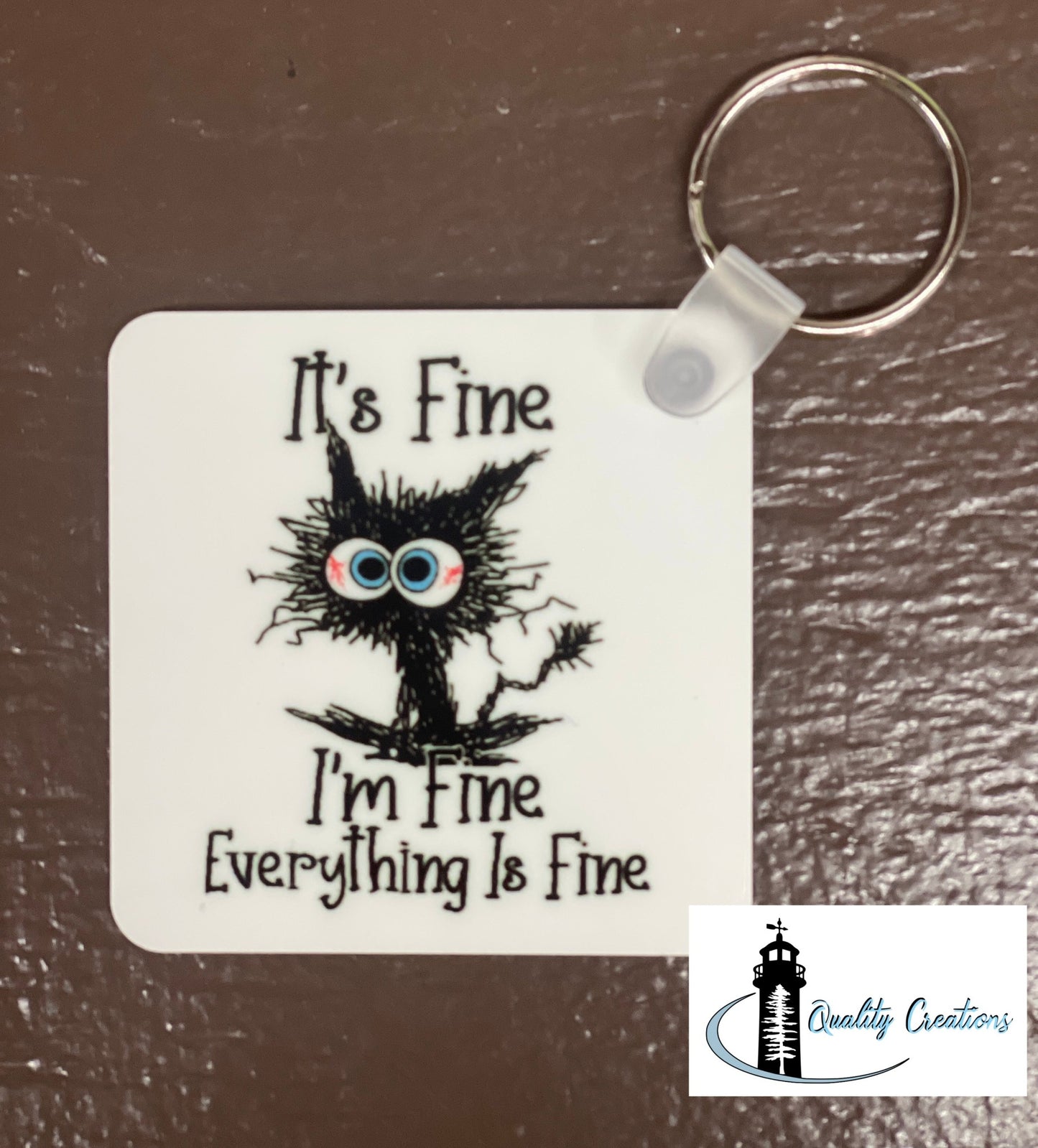 metalaluminumsquarekeychainitsfineimfineblackcatmonctonsalisburynewbrunswickcanada