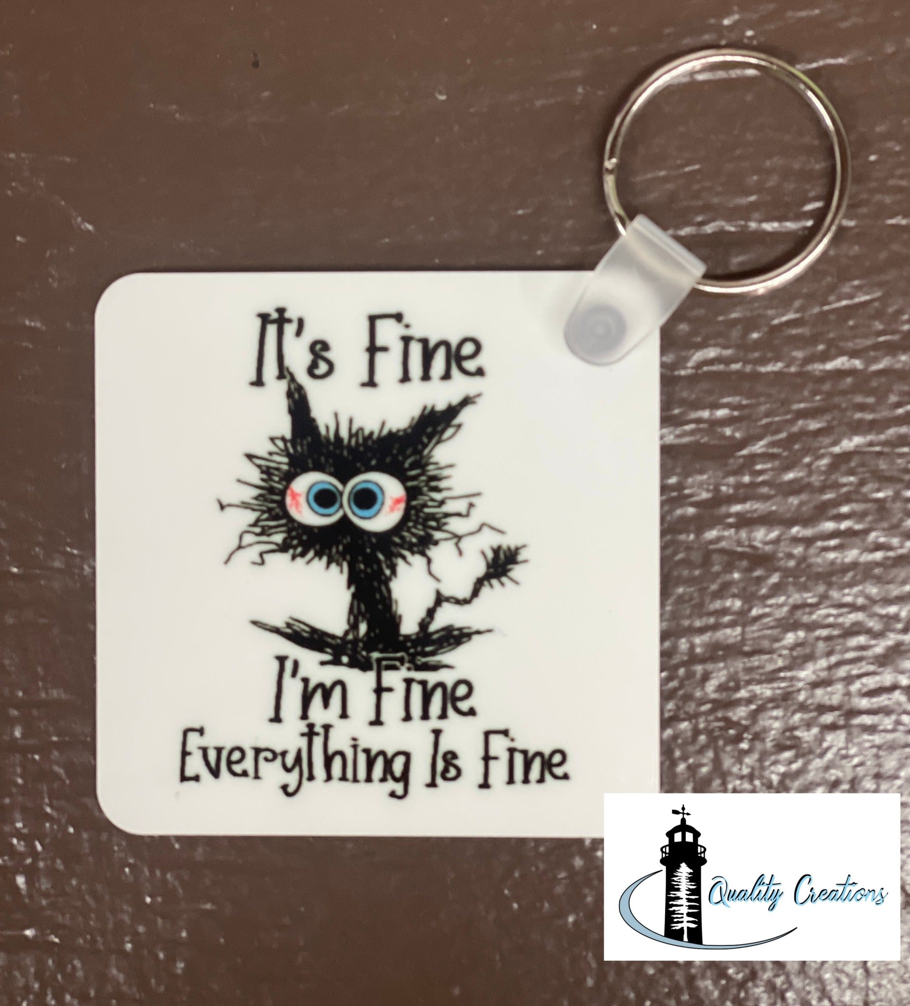 metalaluminumsquarekeychainitsfineimfineblackcatmonctonsalisburynewbrunswickcanada