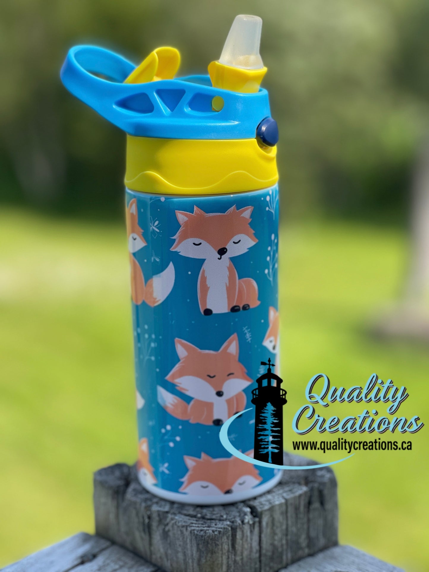 Personalized kids’ insulated stainless steel tumbler with straw and handle featuring a cute woodland fox design. Custom kids’ water bottle by Quality Creations, Canada.